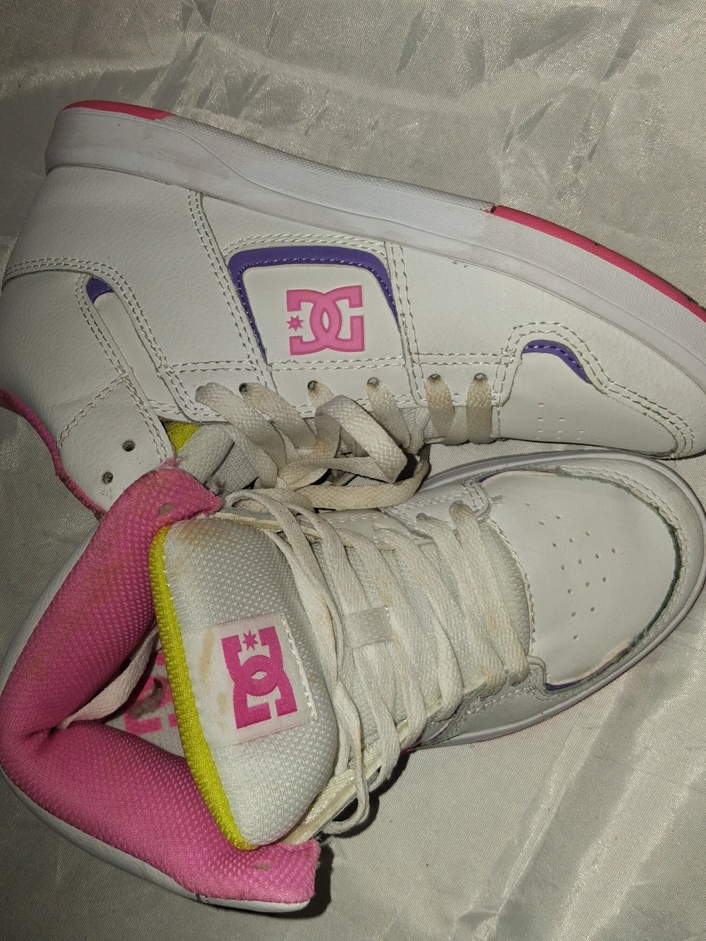 DC White High-Top Sneakers with Pink and Purple Accents